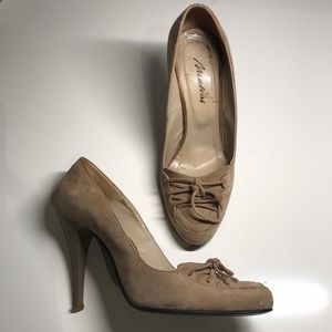 Beige suede pumps with front lace detail